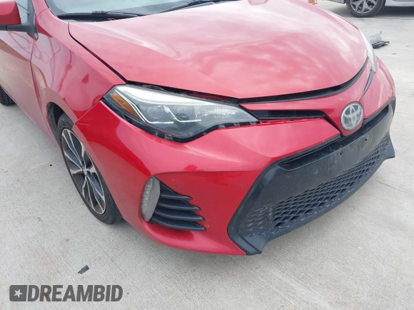 2017 Toyota Corolla L z VIN 5YFBURHE9HP610157, wystawiony jako IAAI lot #40999523 z przebiegiem 185 454 mil mil oraz . Historia ofert i sprzedaży dostępna na DreamBid. Obrazek 17.
