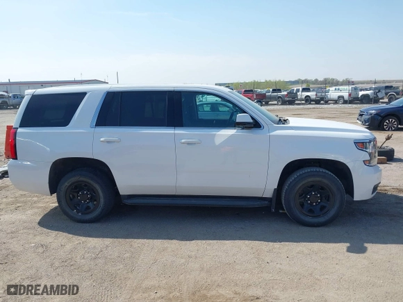2020 Chevrolet Tahoe Commercial with VIN 1GNSKDEC8LR258254, listed as a IAAI auction lot 42104608 with 105,895 mi miles. Bid and sale history available at carsss.com. Image 14.