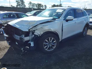 2019 Mazda CX-9 Touring with VIN JM3TCBCYXK0332409, listed as a IAAI auction lot 41567494 with 58,395 mi miles. Bid and sale history available at carsss.com. Image 2.