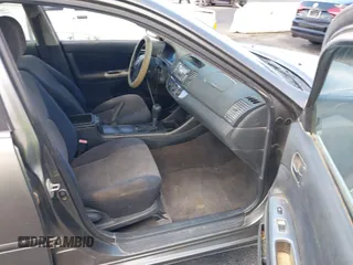 2003 Toyota Camry LE with VIN JTDBE32K130149032, listed as a IAAI auction lot 42063174 with 241,424 mi miles and . Bid and sale history available at DreamBid. Image 5.