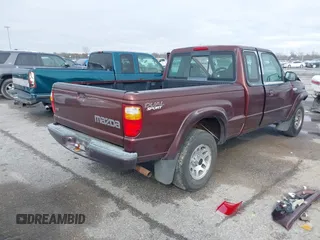 2003 Mazda B-Series 2WD Truck DS with VIN 4F4YR16U83TM17272, listed as a IAAI auction lot 41387645 with 162,810 mi miles. Bid and sale history available at carsss.com. Image 4.