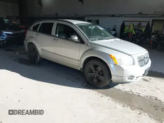 2011 Dodge Caliber Mainstreet with VIN 1B3CB3HA4BD121598, listed as a IAAI auction lot 41202366 with 92,012 mi miles. Bid and sale history available at carsss.com. Image 1.