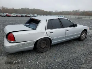 1999 Ford Crown Victoria Police with VIN 2FAFP71W8XX237354, listed as a Copart auction lot 79340304 with 198,482 mi miles and Salvage Title. Bid and sale history available at carsss.com. Image 3.