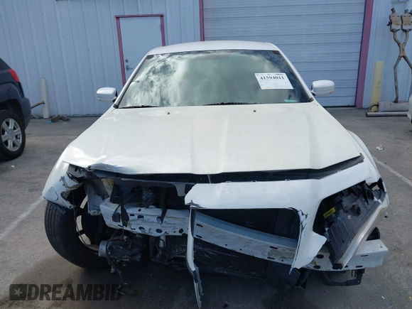 2014 Chrysler 300 S z VIN 2C3CCABG5EH344712, wystawiony jako IAAI lot #41594011 z przebiegiem 173 310 mil mil oraz . Historia ofert i sprzedaży dostępna na DreamBid. Obrazek 12.