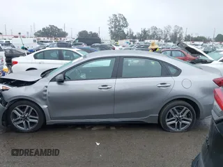 2023 Kia Forte GT-Line z VIN 3KPF54AD8PE602683, wystawiony jako IAAI lot #41444418 z przebiegiem 52 229 mil mil oraz . Historia ofert i sprzedaży dostępna na DreamBid. Obrazek 14.