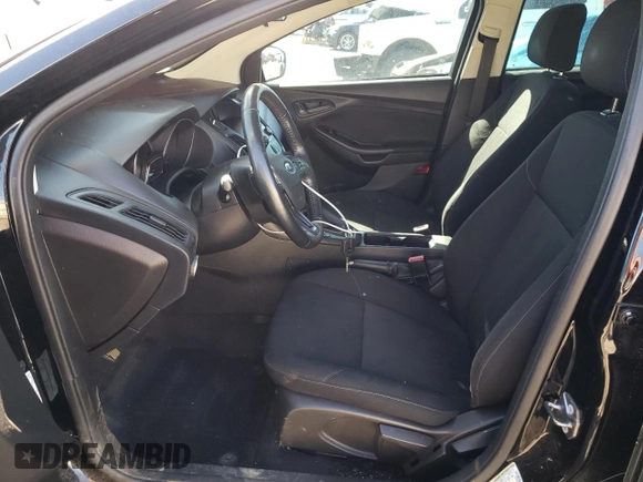2018 Ford Focus S with VIN 1FADP3E28JL256904, listed as a Copart auction lot 49379685 with 97,548 mi miles and Salvage Title. Bid and sale history available at carsss.com. Image 7.