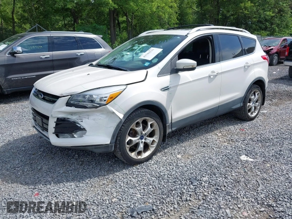2013 Ford Escape Titanium z VIN 1FMCU9J9XDUA10838, wystawiony jako IAAI lot #42702521 z przebiegiem 86 815 mil mil oraz . Historia ofert i sprzedaży dostępna na DreamBid. Obrazek 2.