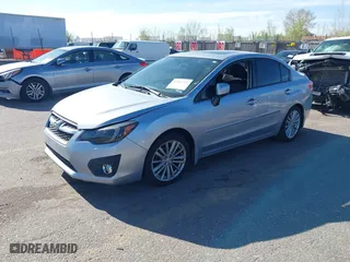 2012 Subaru Impreza Sedan 2.0i Limited with VIN JF1GJAH69CH030040, listed as a IAAI auction lot 42047722 with 127,807 mi miles. Bid and sale history available at carsss.com. Image 2.