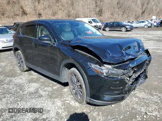 2017 Mazda CX-5 Grand Touring with VIN JM3KFBDL6H0211374, listed as a Copart auction lot 49079775 with 142,164 mi miles and Salvage Title. Bid and sale history available at carsss.com. Image 4.