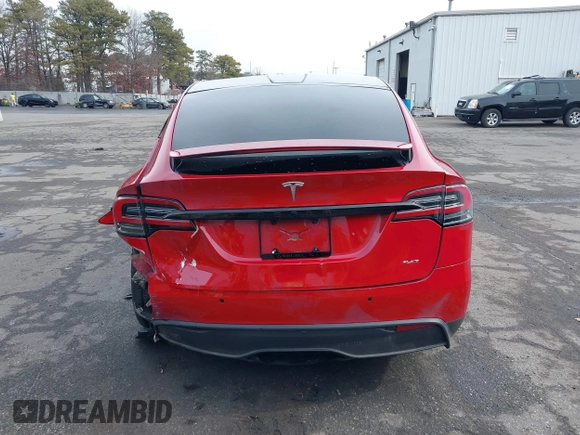 2022 Tesla Model X Plaid with VIN 7SAXCBE60NF330246, listed as a IAAI auction lot 41477394 with 51,612 mi miles and . Bid and sale history available at DreamBid. Image 16.