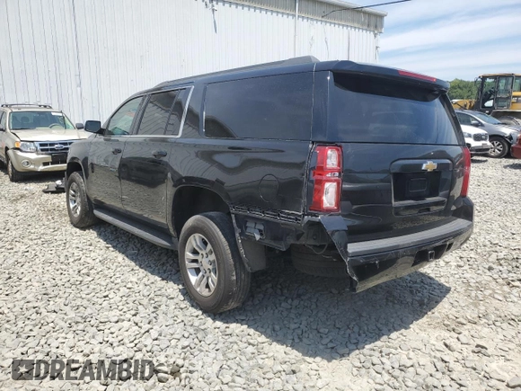 2019 Chevrolet Suburban LT with VIN 1GNSKHKC6KR202548, listed as a Copart auction lot 60195714 with 156,087 mi miles and Salvage Title. Bid and sale history available at DreamBid. Image 2.