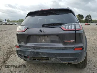 2021 Jeep Cherokee Trailhawk with VIN 1C4PJMBX7MD215581, listed as a Copart auction lot 51281205 with 62,199 mi miles and Salvage title. Bid and sale history available at DreamBid. Image 6.