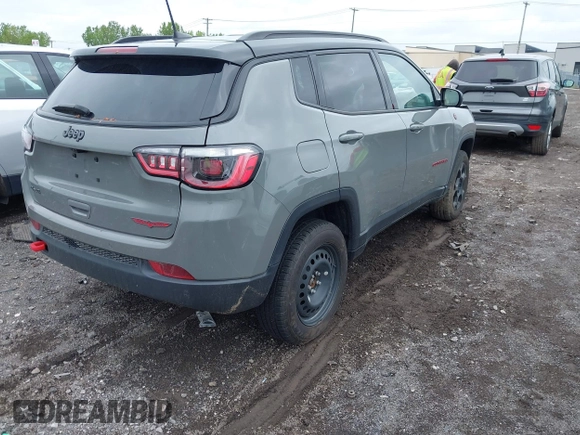 2023 Jeep Compass Trailhawk with VIN 3C4NJDDNXPT562694, listed as a IAAI auction lot 42370873 with 21,988 mi miles and . Bid and sale history available at DreamBid. Image 4.