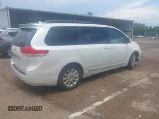 2014 Toyota Sienna XLE with VIN 5TDYK3DC2ES517663, listed as a IAAI auction lot 42171862 with 143,447 mi miles and . Bid and sale history available at DreamBid. Image 4.