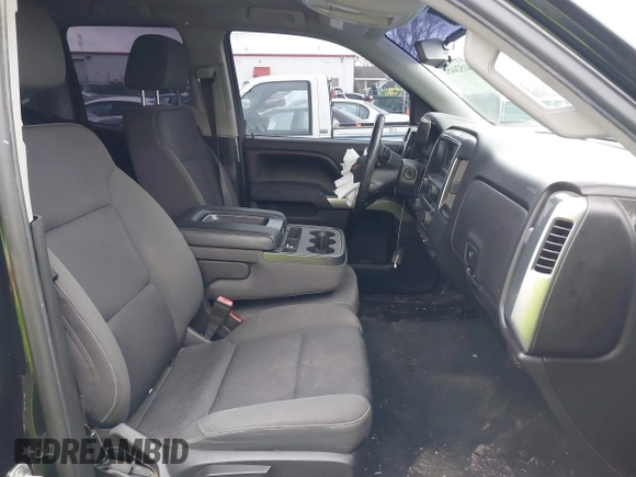 2014 Chevrolet Silverado 1500 LT with VIN 1GCVKREC3EZ149707, listed as a IAAI auction lot 41524452 with 128,338 mi miles and . Bid and sale history available at DreamBid. Image 5.