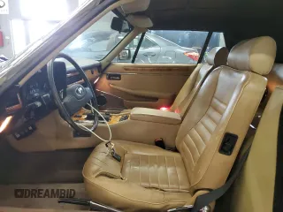 1988 Jaguar XJS z VIN SAJNV5843JC147927, wystawiony jako Copart lot #58988575 z przebiegiem 81 239 mil mil oraz Tytuł czysty. Historia ofert i sprzedaży dostępna na DreamBid. Obrazek 7.