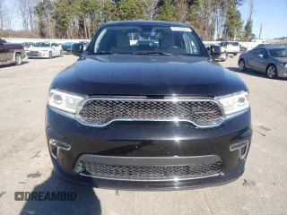 2021 Dodge Durango SXT Plus with VIN 1C4RDJAG8MC598730, listed as a Copart auction lot 87396654 with 82,437 mi miles and Non repairable. Bid and sale history available at DreamBid. Image 5.
