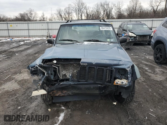 1999 Jeep Cherokee SE with VIN 1J4FF28S9XL576313, listed as a Copart auction lot 88470435 with Not provided miles and Salvage title. Bid and sale history available at DreamBid. Image 5.