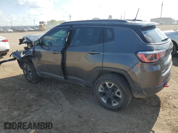 2018 Jeep Compass Trailhawk with VIN 3C4NJDDB0JT458339, listed as a Copart auction lot 58834155 with 103,811 mi miles and Salvage title. Bid and sale history available at DreamBid. Image 2.