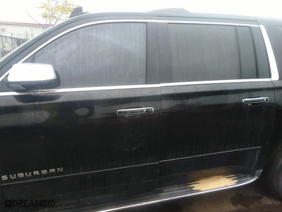 2017 Chevrolet Suburban Premier with VIN 1GNSCJKCXHR312158, listed as a IAAI auction lot 40399105 with 150,560 mi miles. Bid and sale history available at carsss.com. Image 14.