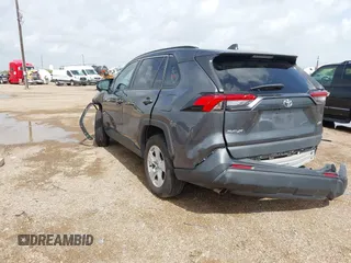 2021 Toyota RAV4 XLE with VIN 2T3W1RFV5MC104078, listed as a IAAI auction lot 42591343 with 57,057 mi miles and . Bid and sale history available at DreamBid. Image 3.