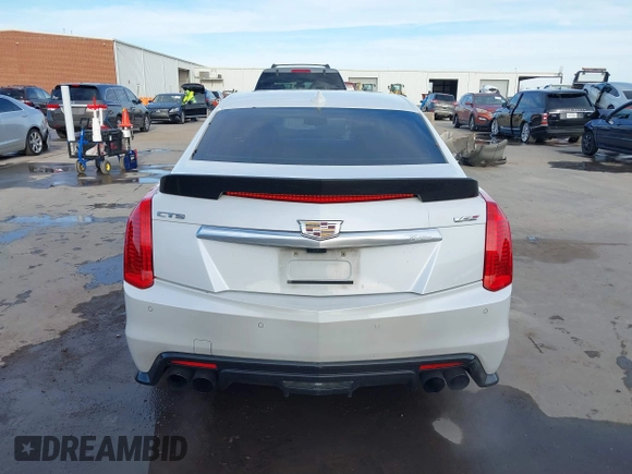 2017 Cadillac CTS-V z VIN 1G6A15S64H0137358, wystawiony jako IAAI lot #41336455 z przebiegiem 76 367 mil mil oraz . Historia ofert i sprzedaży dostępna na DreamBid. Obrazek 16.
