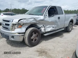2013 Ford F-150 XL with VIN 1FTFX1EF9DFA65537, listed as a IAAI auction lot 41965850 with 212,491 mi miles. Bid and sale history available at carsss.com. Image 2.