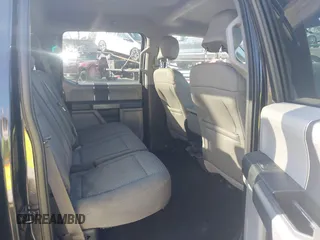 2015 Ford F-150 XLT with VIN 1FTEW1E86FFC00959, listed as a IAAI auction lot 41581711 with 130,298 mi miles. Bid and sale history available at carsss.com. Image 8.