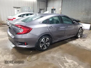 2018 Honda Civic EX-T with VIN 19XFC1F42JE000270, listed as a Copart auction lot 46618665 with 54,321 mi miles and Salvage title. Bid and sale history available at DreamBid. Image 3.