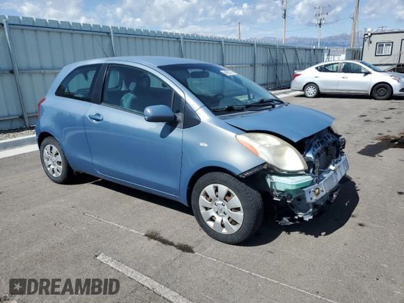 2008 Toyota Yaris with VIN JTDJT923185164654, listed as a Copart auction lot 54052575 with 242,505 mi miles and Salvage Title. Bid and sale history available at DreamBid. Image 4.