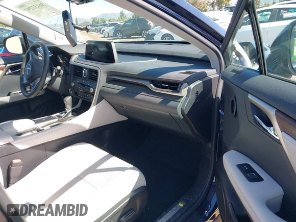2022 Lexus RX with VIN 2T2HZMAA6NC253324, listed as a IAAI auction lot 36137292 with 6,266 mi miles. Bid and sale history available at carsss.com. Image 5.