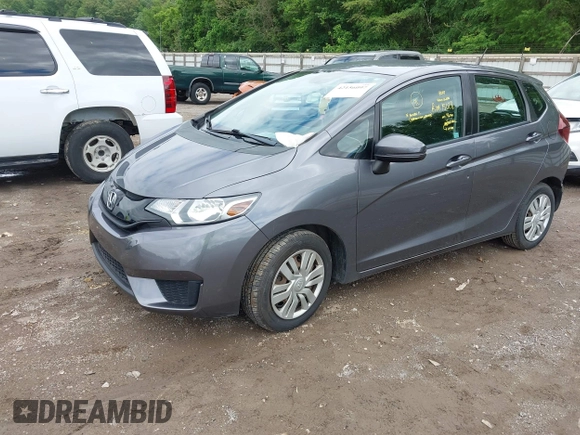 2015 Honda Fit LX z VIN 3HGGK5H59FM714352, wystawiony jako IAAI lot #42156097 z przebiegiem 103 587 mil mil oraz . Historia ofert i sprzedaży dostępna na DreamBid. Obrazek 17.