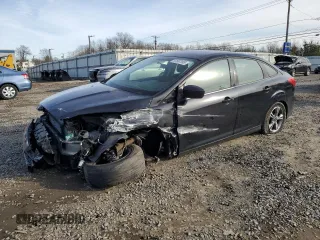 2018 Ford Focus SE with VIN 1FADP3FE6JL232769, listed as a Copart auction lot 87667595 with 124,496 mi miles and Salvage title. Bid and sale history available at DreamBid. Image 1.