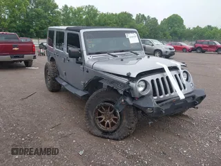 2014 Jeep Wrangler Unlimited Sahara z VIN 1C4HJWEG2EL326655, wystawiony jako IAAI lot #42365165 z przebiegiem 82 044 mil mil oraz . Historia ofert i sprzedaży dostępna na DreamBid. Obrazek 1.