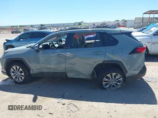 2021 Toyota RAV4 XLE Premium with VIN 2T3C1RFV0MW140682, listed as a IAAI auction lot 42315813 with 98,267 mi miles and . Bid and sale history available at DreamBid. Image 14.