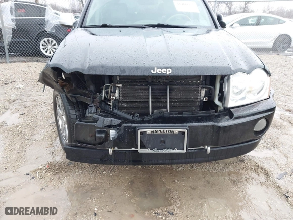 2006 Jeep Grand Cherokee Overland with VIN 1J8HR68296C308382, listed as a IAAI auction lot 41466673 with 167,028 mi miles. Bid and sale history available at carsss.com. Image 6.