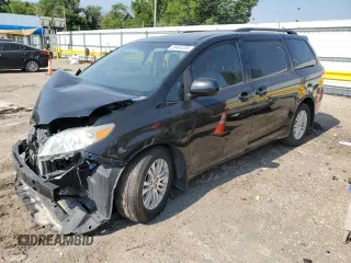 2012 Toyota Sienna XLE AAS with VIN 5TDYK3DC6CS211062, listed as a Copart auction lot 59404205 with Not provided miles and Salvage title. Bid and sale history available at DreamBid. Image 1.