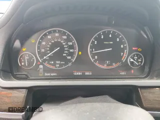 2009 BMW 7 Series 750Li with VIN WBAKB83529CY62069, listed as a Copart auction lot 44820915 with 123,684 mi miles and Salvage title. Bid and sale history available at DreamBid. Image 9.