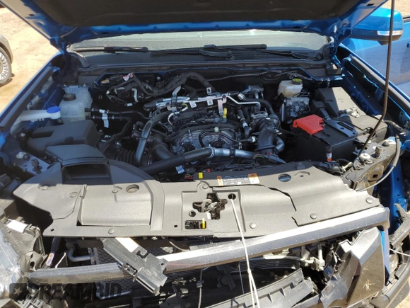 2025 Ford Ranger Lariat with VIN 1FTER4KH9SLE17446, listed as a Copart auction lot 61853775 with 1,810 mi miles and Salvage title. Bid and sale history available at DreamBid. Image 11.