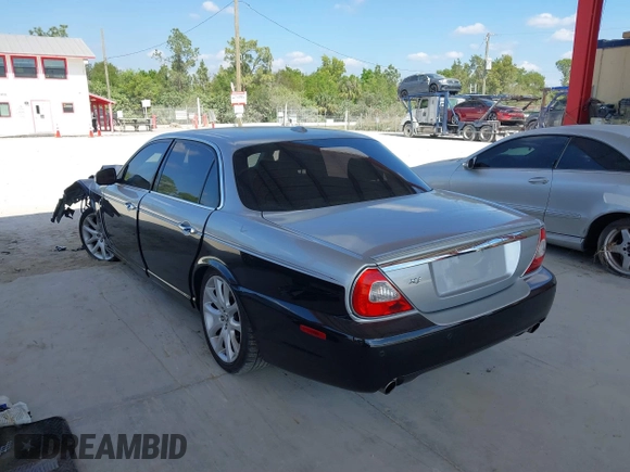 2008 Jaguar XJ with VIN SAJWA79B48SH22788, listed as a IAAI auction lot 41530902 with 124,334 mi miles. Bid and sale history available at carsss.com. Image 3.