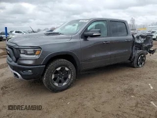 2022 Ram 1500 Rebel z VIN 1C6SRFLT9NN321513, wystawiony jako Copart lot #50262365 z przebiegiem 44 442 mil mil oraz Czysty tytuł • Clean title. Historia ofert i sprzedaży dostępna na DreamBid. Obrazek 1.