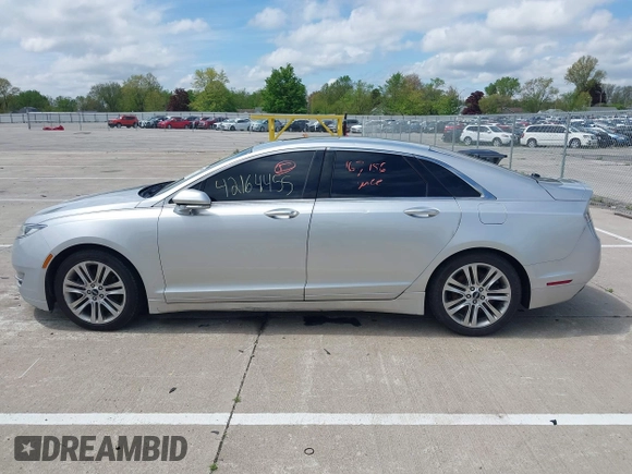 2015 Lincoln MKZ z VIN 3LN6L2GK5FR622117, wystawiony jako IAAI lot #42164455 z przebiegiem 167 156 mil mil oraz . Historia ofert i sprzedaży dostępna na DreamBid. Obrazek 14.