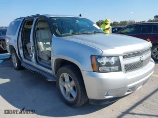 2012 Chevrolet Suburban LT with VIN 1GNSCJE01CR220186, listed as a IAAI auction lot 41476520 with 117,714 mi miles. Bid and sale history available at carsss.com. Image 1.