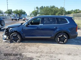 2025 Kia Telluride S with VIN 5XYP64GCXSG587826, listed as a IAAI auction lot 42065749 with 1,864 mi miles and . Bid and sale history available at DreamBid. Image 14.