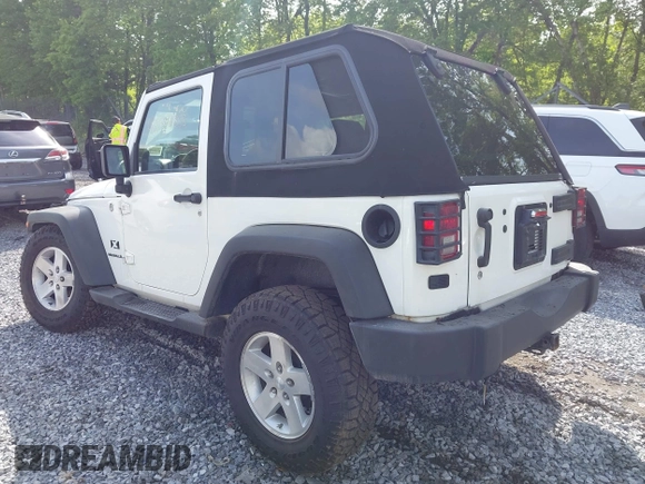 2009 Jeep Wrangler X with VIN 1J4FA24119L727658, listed as a IAAI auction lot 42372855 with 145,450 mi miles and . Bid and sale history available at DreamBid. Image 3.