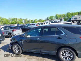 2019 Chevrolet Equinox LT z VIN 3GNAXKEV7KS577515, wystawiony jako IAAI lot #42059917 z przebiegiem 123 278 mil mil oraz . Historia ofert i sprzedaży dostępna na DreamBid. Obrazek 14.