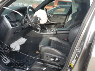 2021 BMW X5 M z VIN 5YMJU0C04M9F64315, wystawiony jako Copart lot #82029464 z przebiegiem Nie podano mil oraz Szkoda całkowita • Salvage title. Historia ofert i sprzedaży dostępna na DreamBid. Obrazek 7.