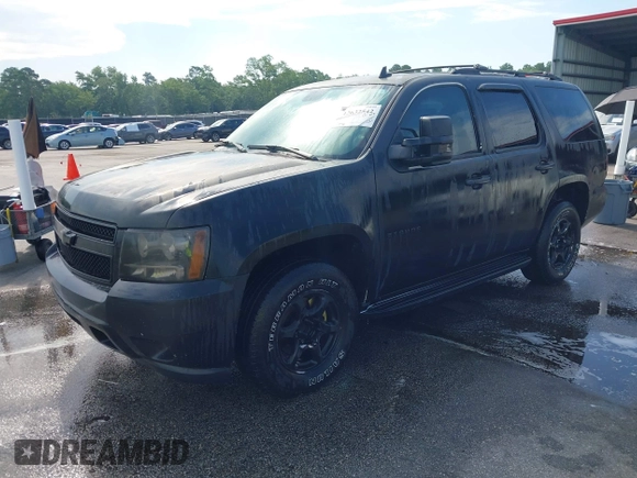 2007 Chevrolet Tahoe LTZ with VIN 1GNFC13J17J149752, listed as a IAAI auction lot 42632542 with 313,740 mi miles and . Bid and sale history available at DreamBid. Image 2.