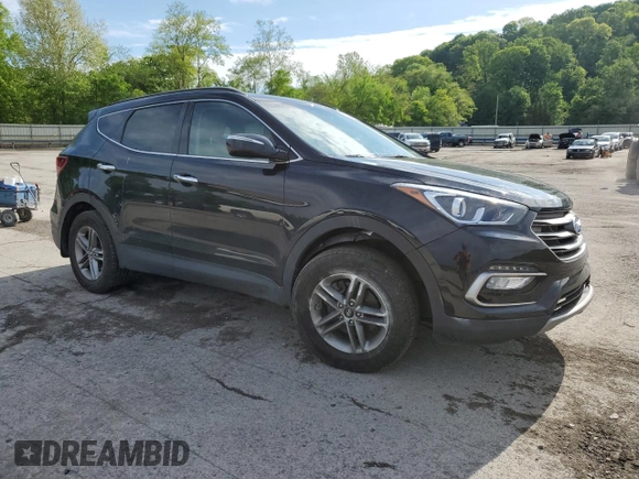 2017 Hyundai Santa Fe 2.4L z VIN 5XYZUDLB1HG412675, wystawiony jako Copart lot #57169045 z przebiegiem 38 947 mil mil oraz Szkoda całkowita • Salvage title. Historia ofert i sprzedaży dostępna na DreamBid. Obrazek 4.