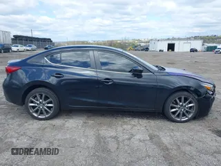 2018 Mazda 3 Touring with VIN 3MZBN1V35JM201844, listed as a IAAI auction lot 42051674 with 75,932 mi miles and . Bid and sale history available at DreamBid. Image 12.
